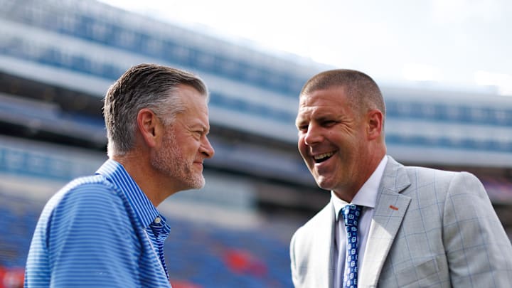 Aug 30, 2025; Gainesville, Florida, USA; Florida Gators athletic director Scott Stricklin and Florida Gators head coach Billy Napier talk before a game against the Long Island Sharks at Ben Hill Griffin Stadium. Mandatory Credit: Matt Pendleton-Imagn Images