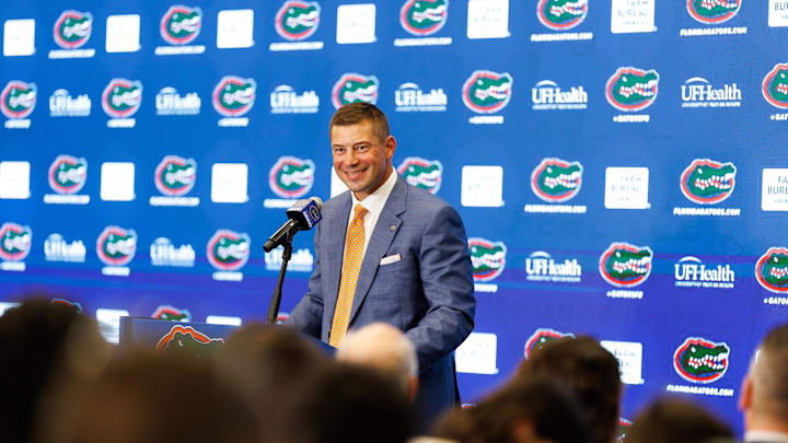 Dec 1, 2025; Gainesville, FL, USA; Florida Gators head coach Jon Sumrall smiles during the press conference at the Heavener Football Training Center at the University of Florida. Mandatory Credit: Matt Pendleton-Imagn Images Dec 1, 2025; Gainesville, FL, USA; Florida Gators head coach Jon Sumrall smiles during the press conference at the Heavener Football Training Center at the University of Florida. Mandatory Credit: Matt Pendleton-Imagn Images
