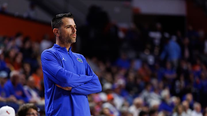 Dec 29, 2025; Gainesville, Florida, USA; Florida Gators head coach Todd Golden looks on against the Dartmouth Big Green during the first half at Exactech Arena at the Stephen C. O'Connell Center. Mandatory Credit: Matt Pendleton-Imagn Images Dec 29, 2025; Gainesville, Florida, USA; Florida Gators head coach Todd Golden looks on against the Dartmouth Big Green during the first half at Exactech Arena at the Stephen C. O'Connell Center. Mandatory Credit: Matt Pendleton-Imagn Images