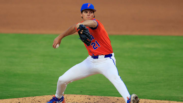 Florida utility Caden McDonald (21) pitches during the fifth inning of an NCAA college baseball matchup Tuesday, March 25, 2025 at VyStar Ballpark in Jacksonville, Fla. FSU rallied to defeat UF 8-4 off a walk-off grand slam from Alex Lodise in the ninth inning. [Corey Perrine/Florida Times-Union]