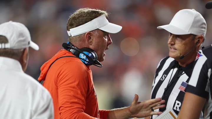 Sep 6, 2025; Auburn, Alabama, USA;  Auburn Tigers head coach Hugh Freeze complains to a game official during the third quarter against the Ball State Cardinals at Jordan-Hare Stadium. Mandatory Credit: John Reed-Imagn Images