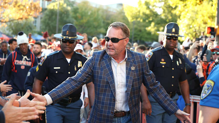 Nov 1, 2025; Auburn, Alabama, USA;  Auburn Tigers head coach Hugh Freeze greets fans during Tiger Walk before the game against the Kentucky Wildcats at Jordan-Hare Stadium. Mandatory Credit: John Reed-Imagn Images