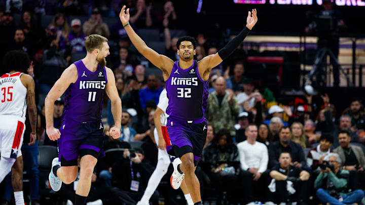 Jan 16, 2026; Sacramento, California, USA; Sacramento Kings center Dylan Cardwell (32) celebrates after a dunk during the second quarter against the Washington Wizards at Golden 1 Center. Mandatory Credit: Sergio Estrada-Imagn Images