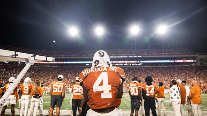 Oct 19, 2024; Austin, Texas, USA; Texas Longhorns corner back Andrew Mukuba (4) watching the game in the fourth quarter against the Georgia Bulldogs at Darrell K Royal-Texas Memorial Stadium. Mandatory Credit: Brett Patzke-Imagn Images