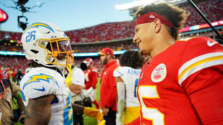 Oct 22, 2023; Kansas City, Missouri, USA; Los Angeles Chargers cornerback Asante Samuel Jr. (26) talks with Kansas City Chiefs quarterback Patrick Mahomes (15) after a game at GEHA Field at Arrowhead Stadium. Mandatory Credit: Jay Biggerstaff-Imagn Images Oct 22, 2023; Kansas City, Missouri, USA; Los Angeles Chargers cornerback Asante Samuel Jr. (26) talks with Kansas City Chiefs quarterback Patrick Mahomes (15) after a game at GEHA Field at Arrowhead Stadium. Mandatory Credit: Jay Biggerstaff-Imagn Images