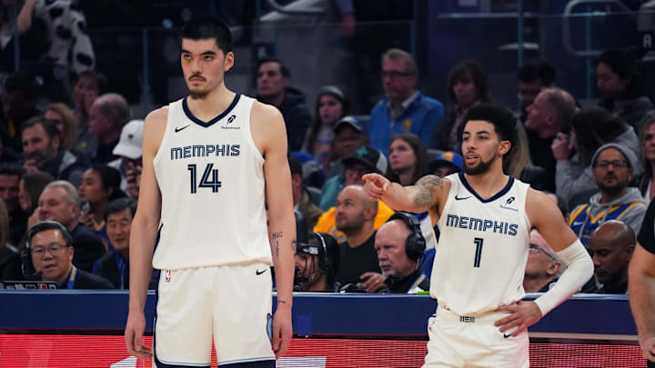 Jan 4, 2025; San Francisco, California, USA;  Memphis Grizzlies center Zach Edey (14) and guard Scotty Pippen Jr. (1) talk before a substitution in the first quarter against the Golden State Warriors at Chase Center. Mandatory Credit: David Gonzales-Imagn Images