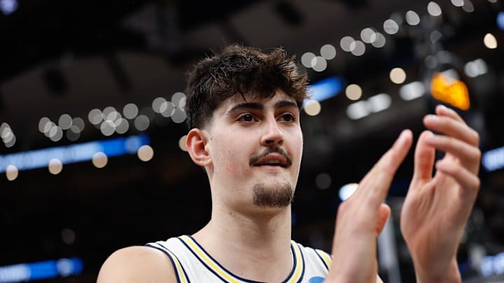 Mar 27, 2026; Chicago, IL, USA; Michigan Wolverines center Aday Mara (15) reacts after defeating the Alabama Crimson Tide in a Sweet Sixteen game of the Midwest Regional of the men's 2026 NCAA Tournament at United Center. Mandatory Credit: Kamil Krzaczynski-Imagn Images Mar 27, 2026; Chicago, IL, USA; Michigan Wolverines center Aday Mara (15) reacts after defeating the Alabama Crimson Tide in a Sweet Sixteen game of the Midwest Regional of the men's 2026 NCAA Tournament at United Center. Mandatory Credit: Kamil Krzaczynski-Imagn Images