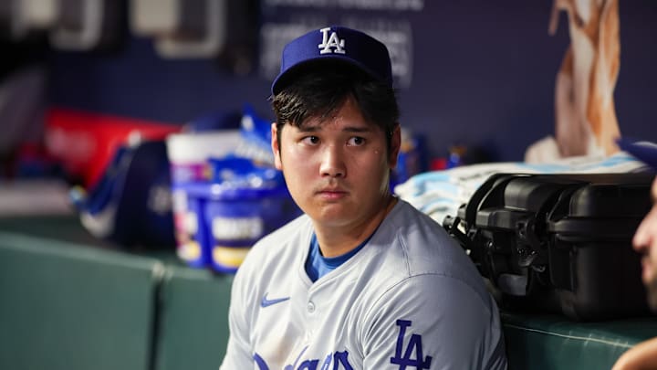 Sep 16, 2024; Atlanta, Georgia, USA; Los Angeles Dodgers designated hitter Shohei Ohtani (17) in the dugout against the Atlanta Braves in the fifth inning at Truist Park. Mandatory Credit: Brett Davis-Imagn Images