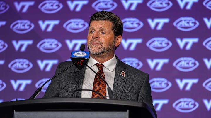 Jul 23, 2024; Charlotte, NC, USA; Virginia Tech head coach Brent Pry answers questions from the media during the ACC Kickoff at Hilton Charlotte Uptown. Mandatory Credit: Jim Dedmon-USA TODAY Sports
