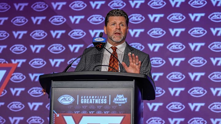 Jul 23, 2024; Charlotte, NC, USA; Virginia Tech head coach Brent Pry answers questions from the media during the ACC Kickoff at Hilton Charlotte Uptown. Mandatory Credit: Jim Dedmon-Imagn Images