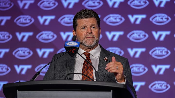 Jul 23, 2024; Charlotte, NC, USA; Virginia Tech head coach Brent Pry answers questions from the media during the ACC Kickoff at Hilton Charlotte Uptown. Mandatory Credit: Jim Dedmon-Imagn Images