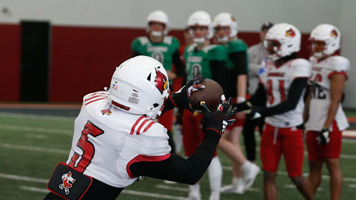 Louisville’s Caullin Lacy (5) catches the ball during Spring Practice on Thursday.
April 4, 2024