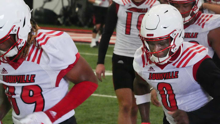 Louisville’s Chris Bell, a junior, warmed up at the first practice of the year.
July 31, 2024