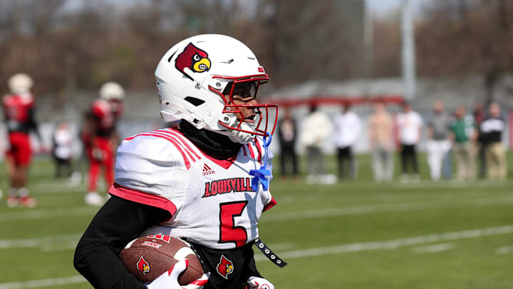 Louisville’s Caullin Lacy, #5, caught the ball during spring practice Friday afternoon.
Mar. 29, 2024