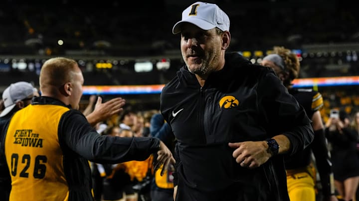 Iowa Hawkeyes offensive coordinator Tim Lester runs off the field after the football game against the Penn State Nittany Lions Oct. 18, 2025 at Kinnick Stadium in Iowa City, Iowa. Iowa Hawkeyes offensive coordinator Tim Lester runs off the field after the football game against the Penn State Nittany Lions Oct. 18, 2025 at Kinnick Stadium in Iowa City, Iowa.