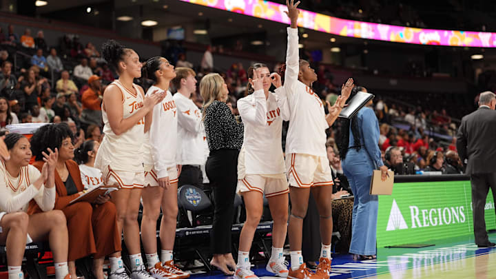 Mar 7, 2026; Greenville, SC, USA; The Texas Longhorns bench react to the score  during the second half against the Mississippi Rebels at Bon Secours Wellness Arena. Mandatory Credit: Jim Dedmon-Imagn Images