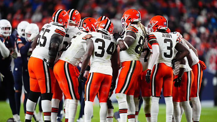 Dec 2, 2024; Denver, Colorado, USA; Members of the Cleveland Browns offensive team huddle in the second half against the Denver Broncos at Empower Field at Mile High. Mandatory Credit: Ron Chenoy-Imagn Images