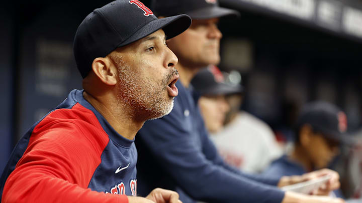  Boston Red Sox manager Alex Cora (13) reacts against the Tampa Bay Rays during the seventh inning at Tropicana Field.