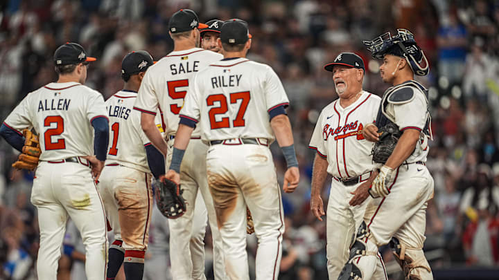Jun 18, 2025; Cumberland, Georgia, USA; Atlanta Braves manager Brian Snitker (43) walks to the mound to replace starting pitcher Chris Sale (51) against the New York Mets during the ninth inning at Truist Park. Mandatory Credit: Dale Zanine-Imagn Images