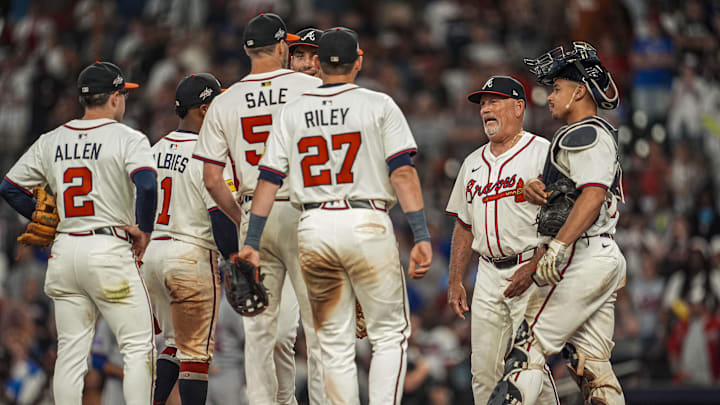 Jun 18, 2025; Cumberland, Georgia, USA; Atlanta Braves manager Brian Snitker (43) walks to the mound to replace starting pitcher Chris Sale (51) against the New York Mets during the ninth inning at Truist Park. Mandatory Credit: Dale Zanine-Imagn Images