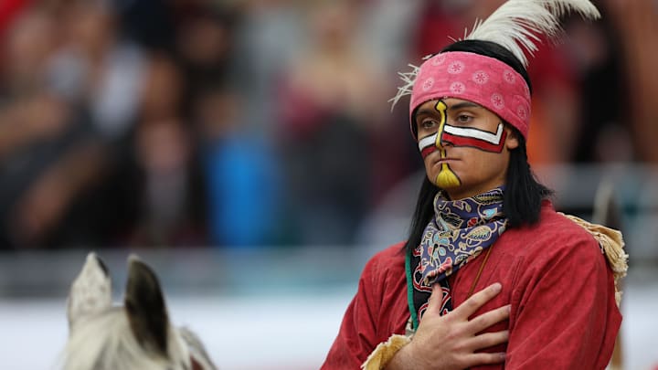 Dec 30, 2023; Miami Gardens, FL, USA; Florida State Seminoles mascot Chief Osceola and Renegade take the field before the game in the 2023 Orange Bowl against the Georgia Bulldogs at Hard Rock Stadium. Mandatory Credit: Nathan Ray Seebeck-Imagn Images