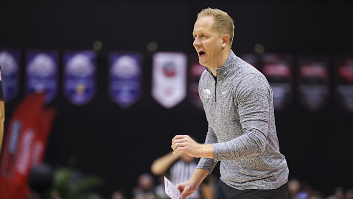 Nov 27, 2025; Kissimmee, Florida, USA; Brigham Young University Cougars head coach Kevin Young reacts to a call against the Miami (FL) Hurricanes in the second half at State Farm Field House. Mandatory Credit: Nathan Ray Seebeck-Imagn Images