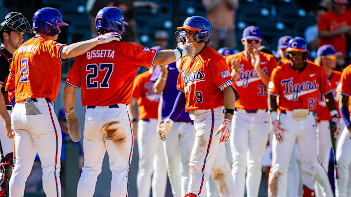 May 24, 2024; Charlotte, NC, USA; Clemson Tigers catcher Jacob Jarrell (9) celebrates at home plate after a sixth inning home run against the Louisville Cardinals during the ACC Baseball Tournament at Truist Field. Mandatory Credit: Scott Kinser-USA TODAY Sports