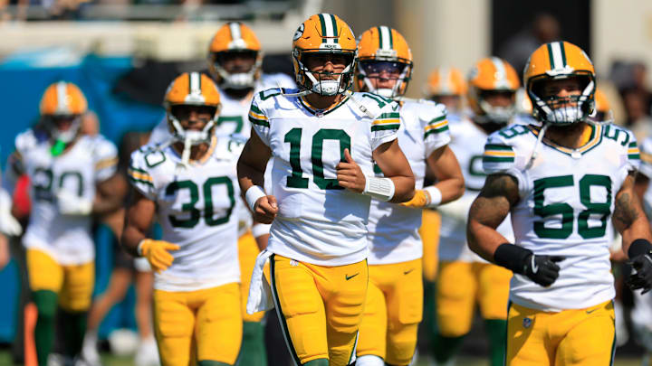 Green Bay Packers quarterback Jordan Love (10) runs on the field with the team before an NFL football matchup Sunday, Oct. 27, 2024 at EverBank Stadium in Jacksonville, Fla. The Packers edged the Jaguars 30-27 on a last-second field goal. [Corey Perrine/Florida Times-Union]