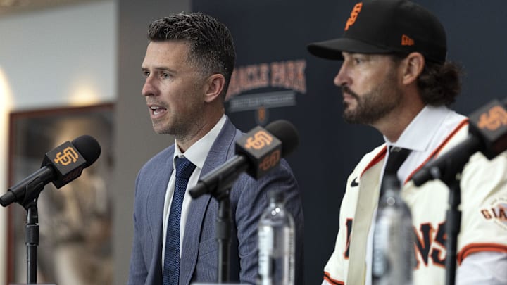 Oct 30, 2025; San Francisco, CA, USA;  San Francisco Giants president of baseball operations Buster Posey (left) speaks next to Tony Vitello (right) as Vitello is introduced as the new manager of the Giants at Oracle Park. Mandatory Credit: D. Ross Cameron-Imagn Images