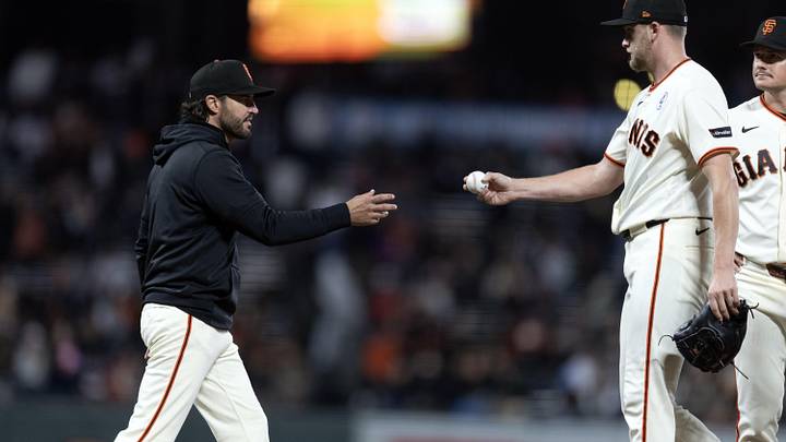Jun 8, 2026; San Francisco, California, USA; San Francisco Giants manager Tony Vitello (left) takes the ball from Keaton Winn during the ninth inning against the Washington Nationals at Oracle Park. Mandatory Credit: D. Ross Cameron-Imagn Images