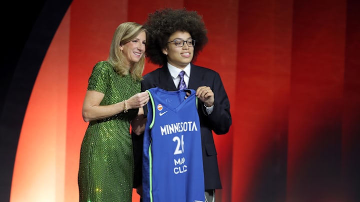 WNBA Commissioner Cathy Engelbert poses for photos with second overall pick Olivia Miles. Mandatory Credit: Brad Penner-Imagn Images