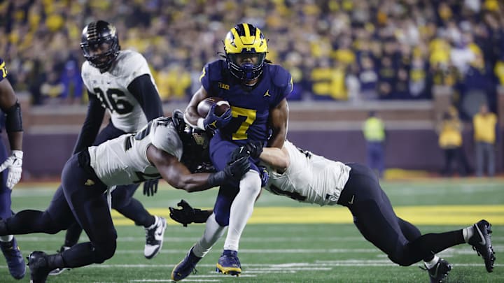 Nov 4, 2023; Ann Arbor, Michigan, USA;  Michigan Wolverines running back Donovan Edwards (7) rushes