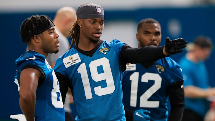 Jacksonville Jaguars WR Joshua Cephus (19) talks with WR Kyric McGowan (83), left, next to WR Devin Duvernay (12) at EverBank Stadium’s Miller Electric Center in Jacksonville, Fla.