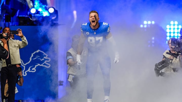 Aidan Hutchinson runs out of the tunnel during the Detroit Lions season opener against the Los Angeles Rams at Ford Field in Detroit, on Sunday, Sept. 8. 2024.
