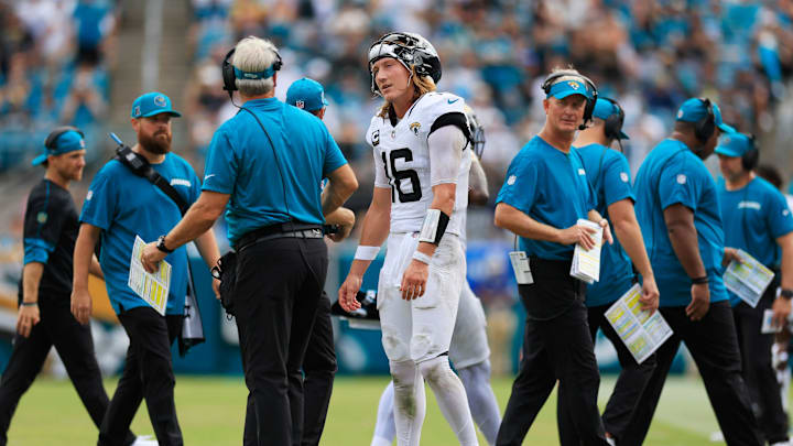 Jacksonville Jaguars quarterback Trevor Lawrence (16) talks with head coach Doug Pederson during the fourth quarter of an NFL football matchup Sunday, Sept. 15, 2024 at EverBank Stadium in Jacksonville, Fla. The Browns defeated the Jaguars 18-13.
