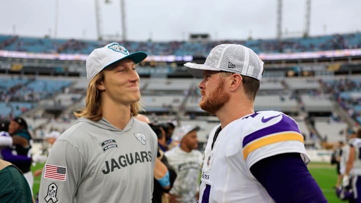 Jacksonville Jaguars quarterback Trevor Lawrence (16), left, and Minnesota Vikings quarterback Sam Darnold (14) talk after the game of an NFL football matchup Sunday, Nov. 10, 2024 at Everbank Stadium in Jacksonville, Fla. The Vikings defeated the Jaguars 12-7. [Corey Perrine/Florida Times-Union]