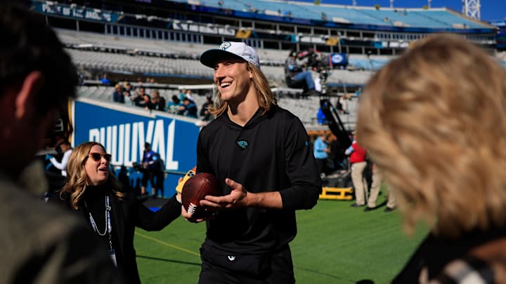 Jacksonville Jaguars quarterback Trevor Lawrence (16) greets fans before an NFL football matchup Sunday, Dec. 1, 2024 at EverBank Stadium in Jacksonville, Fla. [Corey Perrine/Florida Times-Union]