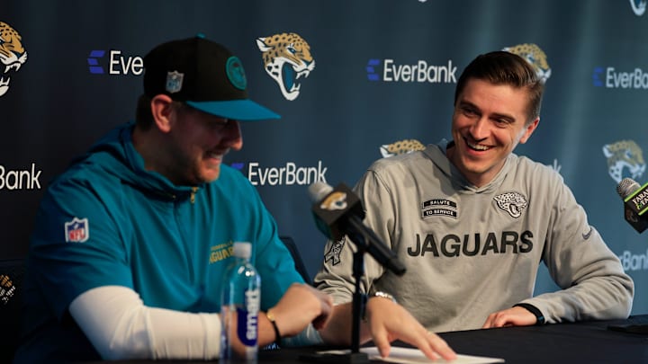 Jacksonville Jaguars general manager James Gladstone, right, smiles at head coach Liam Coen during a press conference at Miller Electric Center Tuesday, April 15, 2025 in Jacksonville, Fla. [Corey Perrine/Florida Times-Union]
