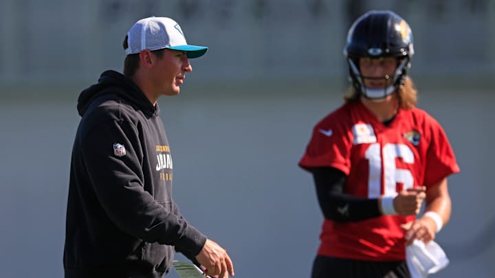 Jacksonville Jaguars offensive coordinator Grant Udinski talks near quarterback Trevor Lawrence (16) during the second mandatory minicamp at Miller Electric Center Wednesday, June 11, 2025 in Jacksonville, Fla. Jacksonville Jaguars offensive coordinator Grant Udinski talks near quarterback Trevor Lawrence (16) during the second mandatory minicamp at Miller Electric Center Wednesday, June 11, 2025 in Jacksonville, Fla.