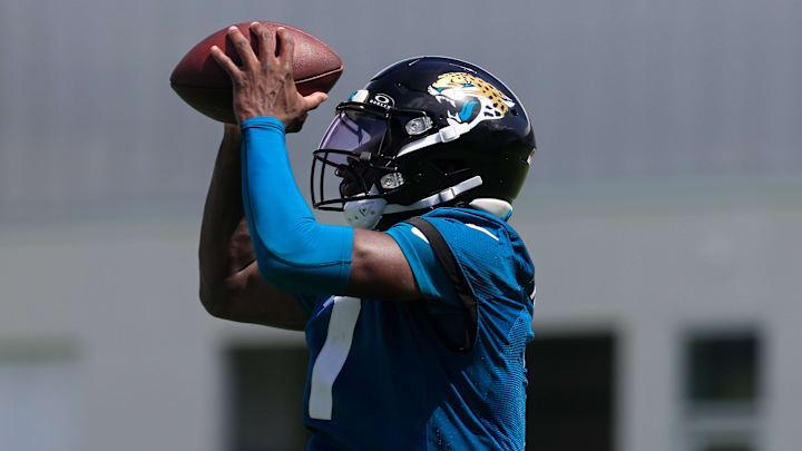Jacksonville Jaguars wide receiver Brian Thomas Jr. (7) catches a pass from quarterback Trevor Lawrence (16), not shown, during the 10th organized team activity at Miller Electric Center Wednesday, June 4, 2025 in Jacksonville, Fla. [Corey Perrine/Florida Times-Union]