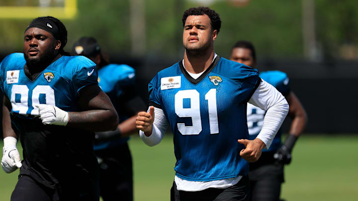 Jacksonville Jaguars defensive end Arik Armstead (91) runs after an NFL training camp session at the Miller Electric Center, Thursday, Aug. 14, 2025 in Jacksonville, Fla.