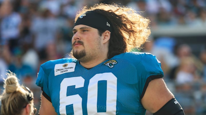 Jacksonville Jaguars center Jonah Monheim (60) runs on the field during an NFL scrimmage event at EverBank Stadium, Friday, Aug. 1, 2025, in Jacksonville, Fla. [Corey Perrine/Florida Times-Union]