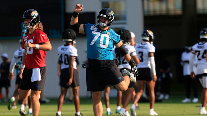 Jacksonville Jaguars offensive tackle Cole Van Lanen (70) stretches during an NFL training camp session at the Miller Electric Center, Wednesday, July 23, 2025, in Jacksonville, Fla. [Corey Perrine/Florida Times-Union]