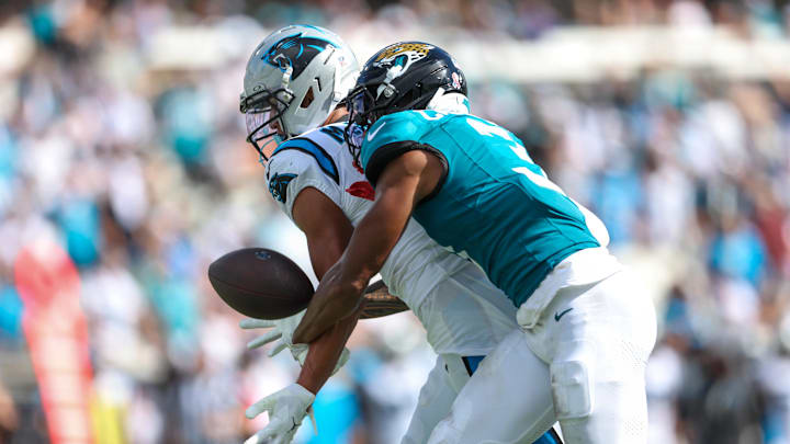 Sep 7, 2025; Jacksonville, Florida, USA; Jacksonville Jaguars cornerback Tyson Campbell (3) defends Carolina Panthers wide receiver Tetairoa McMillan (4) during the second half at EverBank Stadium. 