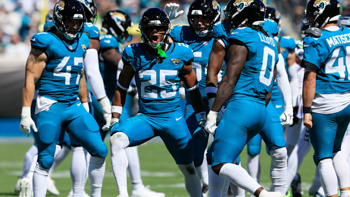 Jacksonville Jaguars safety Rayuan Lane III (25) reacts to his open field tackle on a kickoff return by Seattle Seahawks wide receiver Tory Horton (15) during the first quarter of an NFL football matchup, Sunday, Oct. 12, 2025, at EverBank Stadium in Jacksonville, Fla. The Seahawks defeated the Jaguars 20-12.