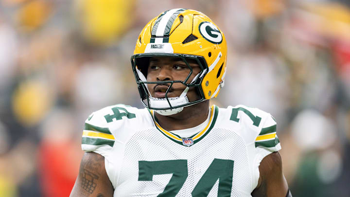 Oct 19, 2025; Glendale, Arizona, USA; Green Bay Packers center Elgton Jenkins (74) against the Arizona Cardinals at State Farm Stadium. Mandatory Credit: Mark J. Rebilas-Imagn Images