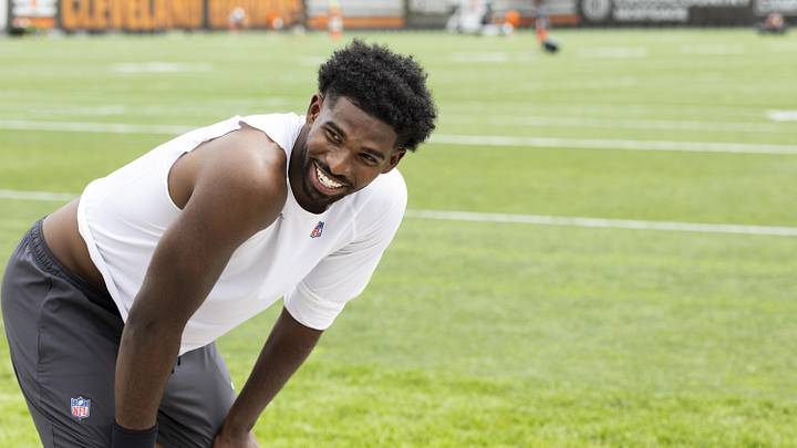 Jun 9, 2026; Berea, OH, USA; Cleveland Browns quarterback Shedeur Sanders (2) laughs after mandatory mini camp at Cross Country Mortgage Campus. Mandatory Credit: Scott Galvin-Imagn Images