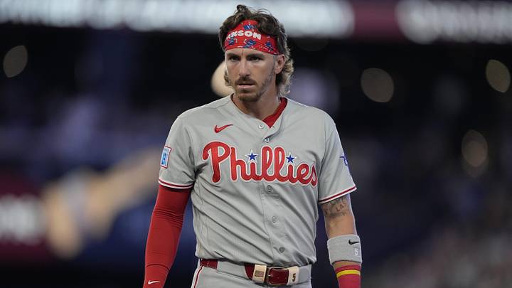 Jun 8, 2026; Toronto, Ontario, CAN; Philadelphia Phillies second baseman Bryson Stott (5) after getting put out at first base against the Toronto Blue Jays during the eighth inning at Rogers Centre. Mandatory Credit: John E. Sokolowski-Imagn Images