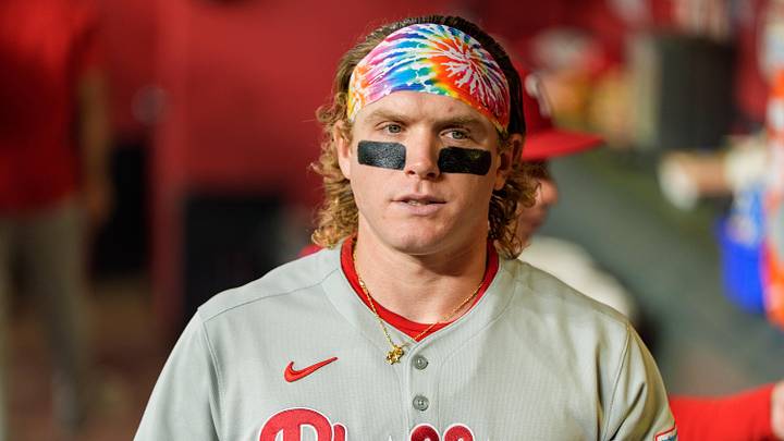 Sep 21, 2025; Phoenix, Arizona, USA; Philadelphia Phillies outfielder Harrison Bader (2) readies hiimself in the dugout before the start of a game against the Arizona Diamondbacks at Chase Field. Mandatory Credit: Allan Henry-Imagn Images