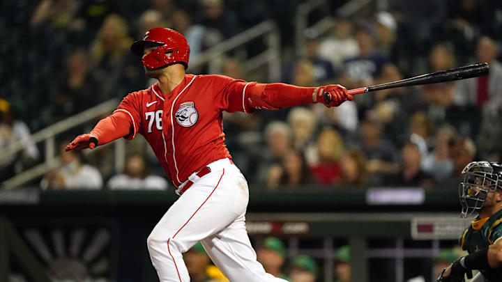 Cincinnati Reds non-roster invitee catcher Aramis Garcia (76) hits his second home run of the game.